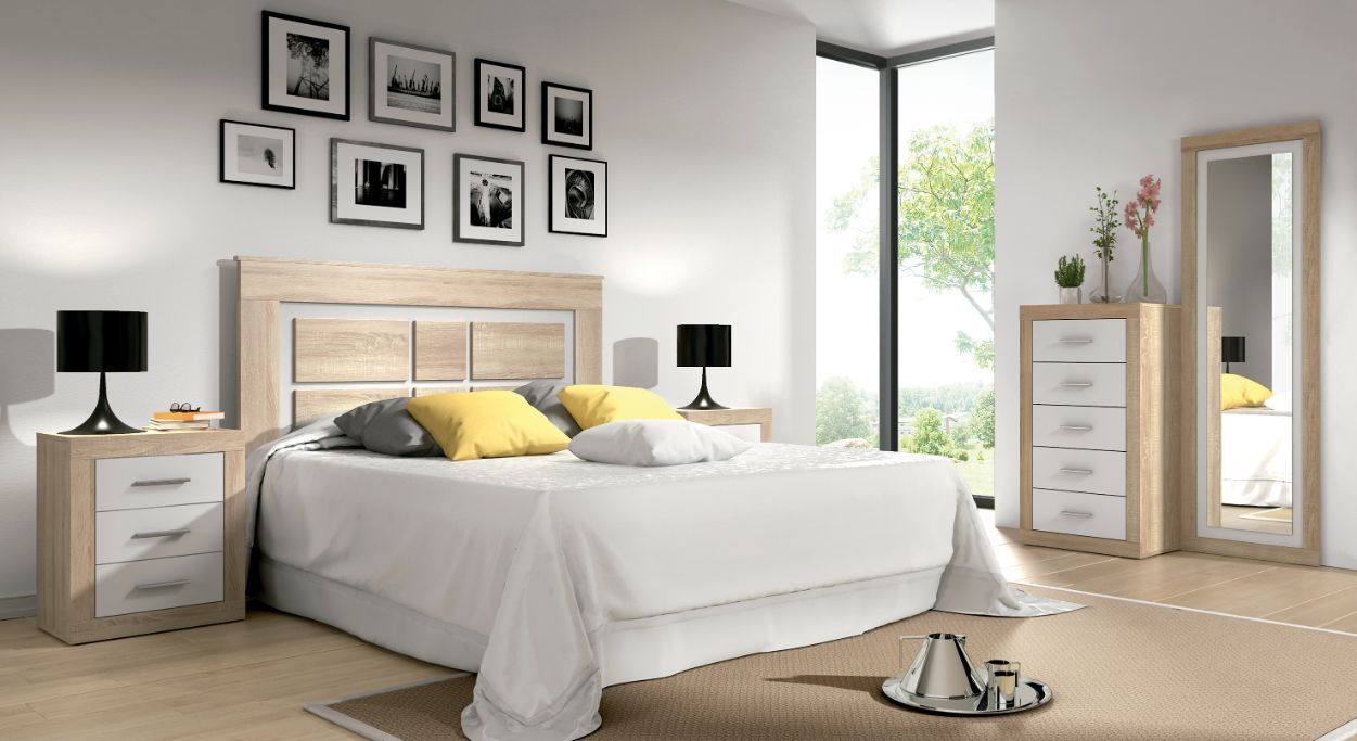 Dormitorio de matrimonio con cabecero decoradoblanco