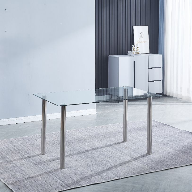 Mesa de comedor de cristal con patas cromadas